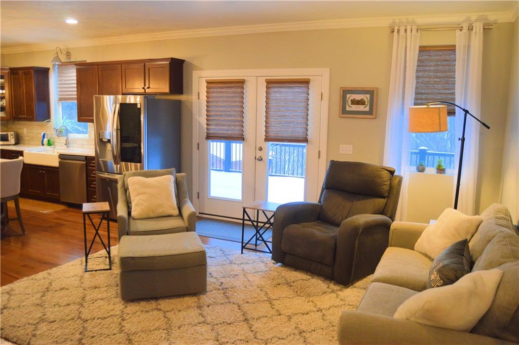 2169 Lovi Road Freedom, PA 15042 - Photo 7 of 25 a living room with furniture and a floor to ceiling window