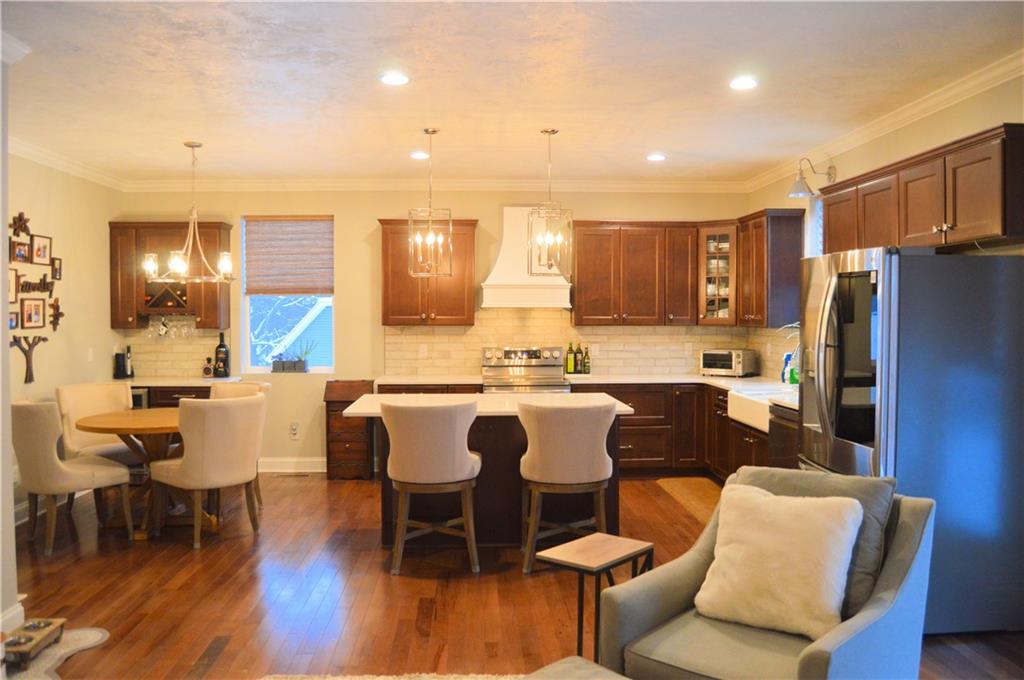 2169 Lovi Road Freedom, PA 15042 - Photo 9 of 25 a large kitchen with a table and chairs