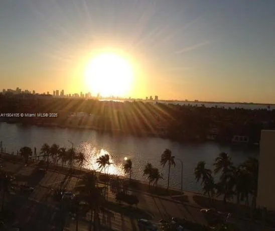 a view of a swimming pool with lounge chair