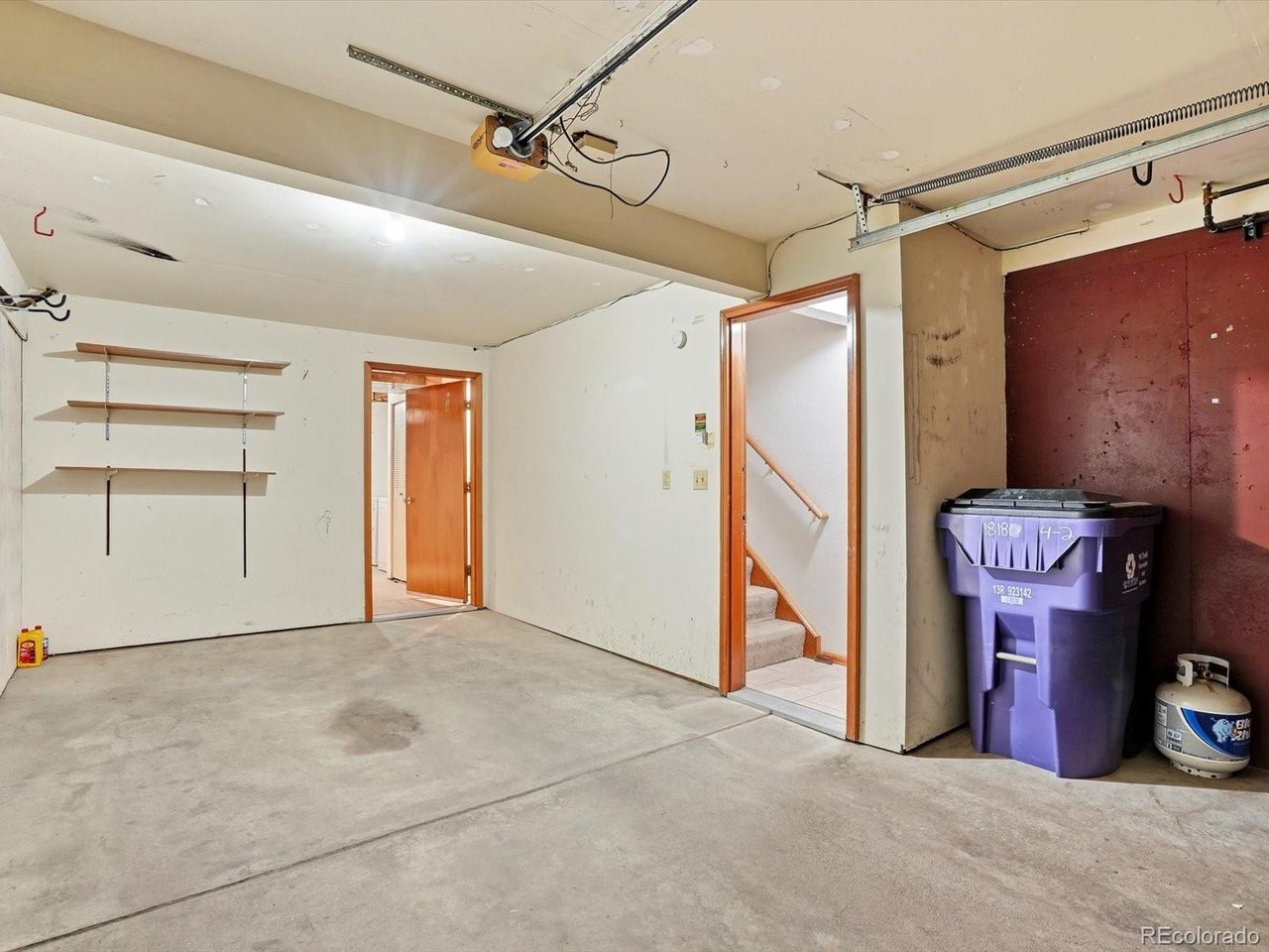 1818 South Quebec Way, Unit 2 Denver, CO 80231 - Photo 15 of 16 a view of an empty room with a fireplace