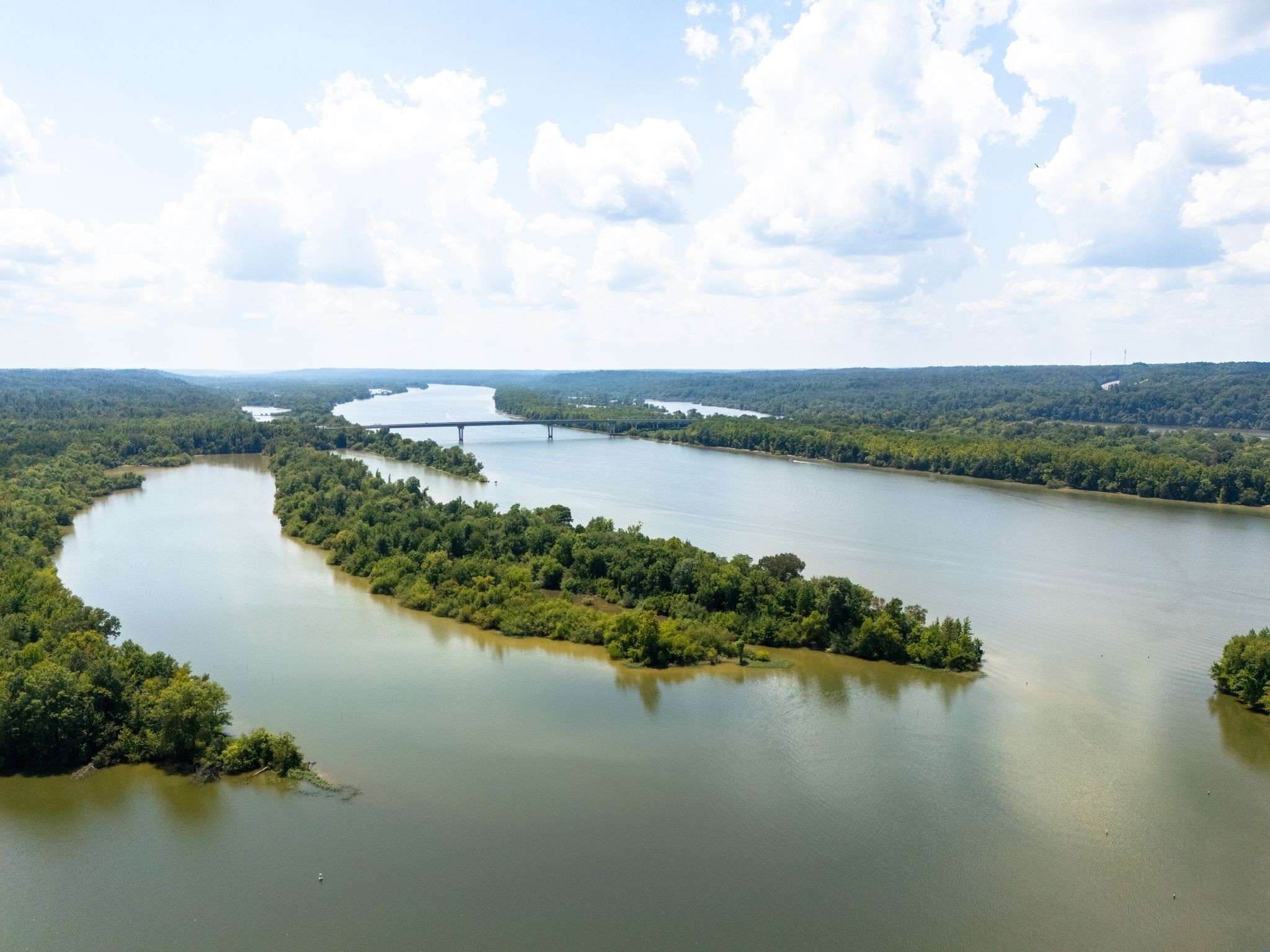 425 Dyer Road Hurricane Mills, TN 37078 - Photo 32 of 36 a view of a lake with houses in the back
