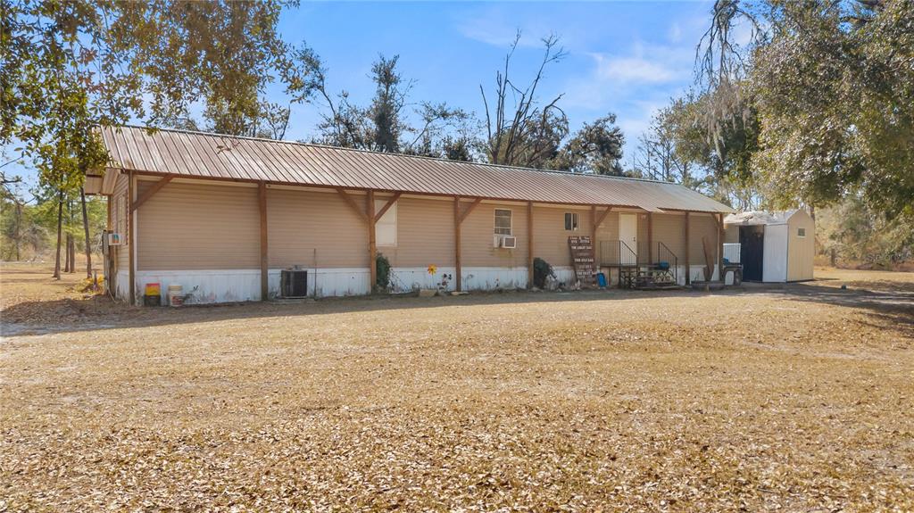 1650 Lyman Hendry Road, Unit 2 Perry, FL 32347 - Photo 1 of 26 a backyard of a house