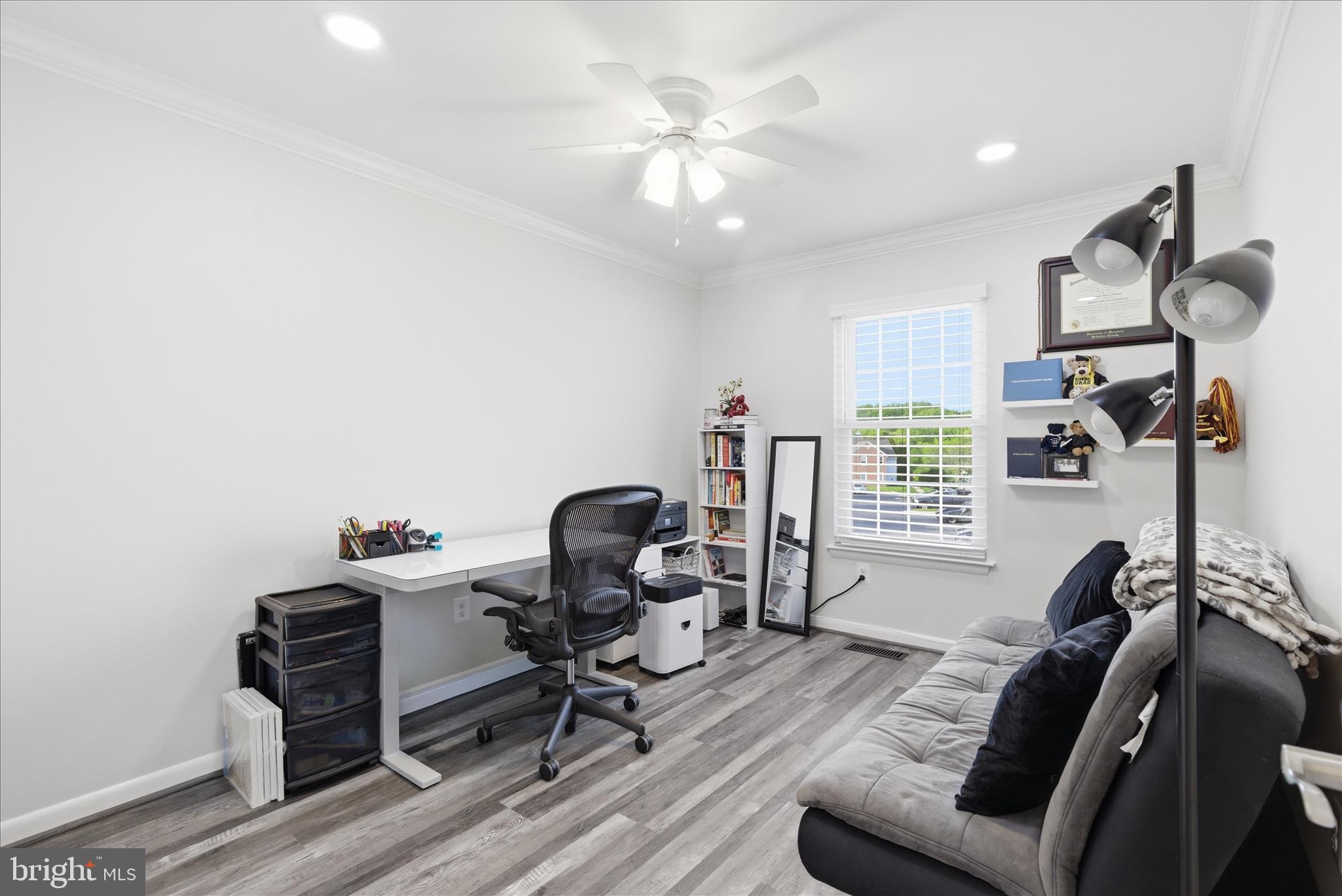 1008 Spring Valley Court Fort Washington, MD 20744 - Photo 15 of 25 a view of a workspace with furniture and a window