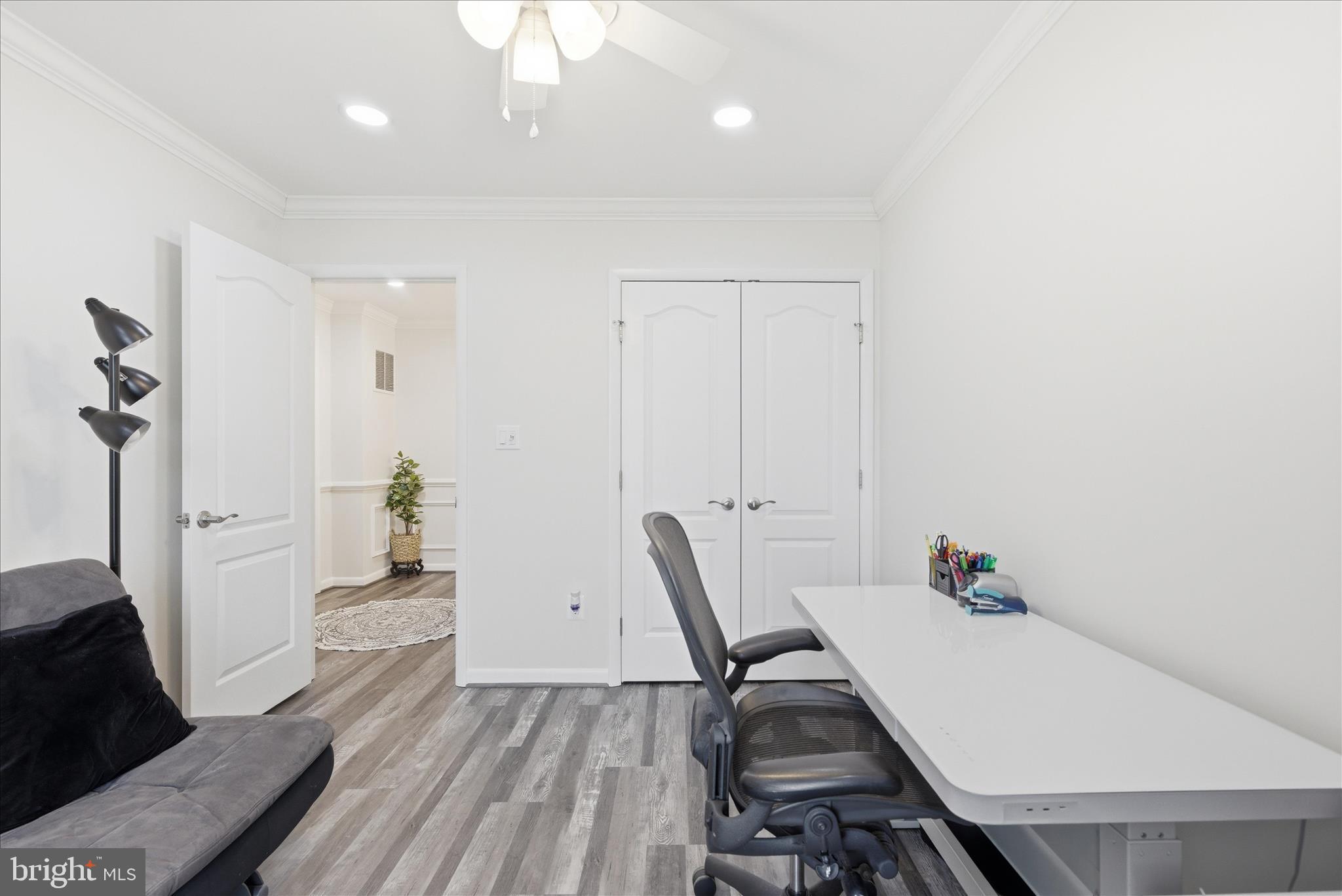 1008 Spring Valley Court Fort Washington, MD 20744 - Photo 16 of 25 a view of a room with furniture and wooden floor