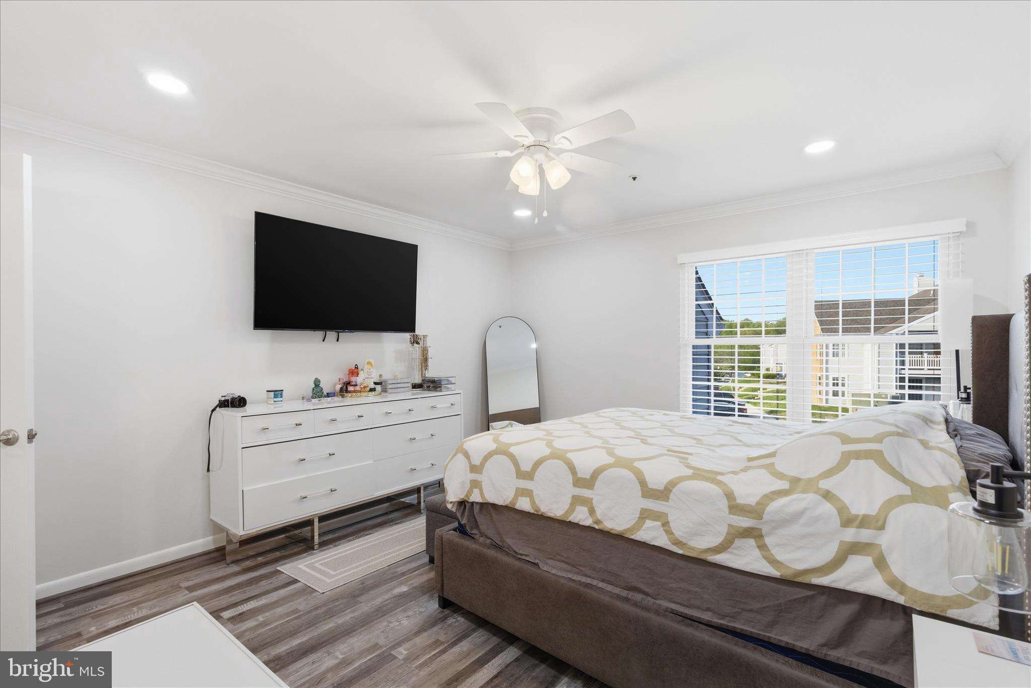 1008 Spring Valley Court Fort Washington, MD 20744 - Photo 18 of 25 a bedroom with a bed and a flat screen tv