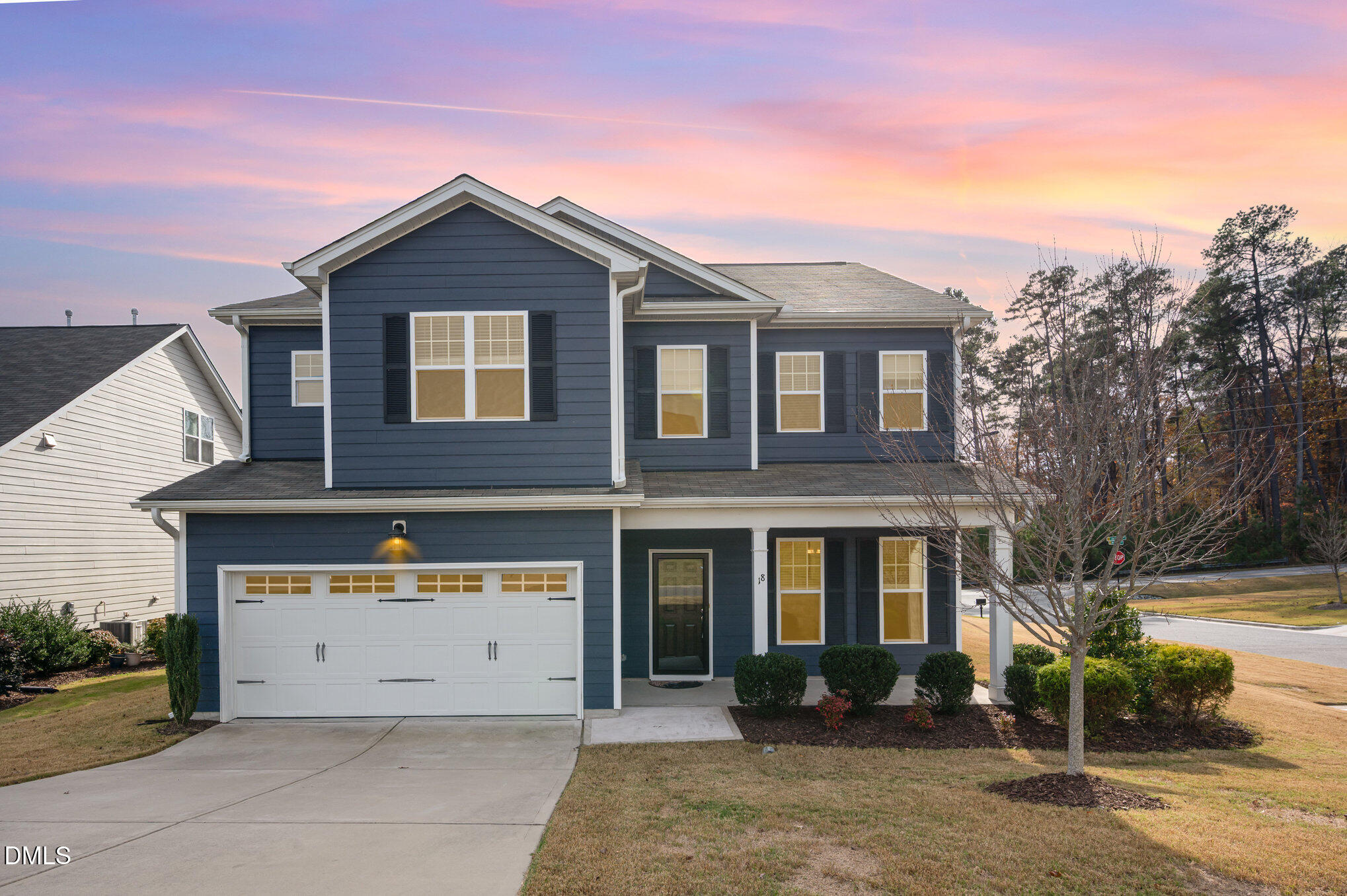 18 Dover Ridge Court Chapel Hill, NC 27517 - Photo 1 of 40 a front view of a house with garden