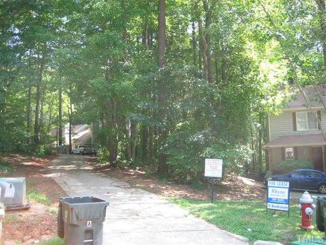 5102 Vann Street Raleigh, NC 27606 - Photo 4 of 4 a front view of a house with a yard