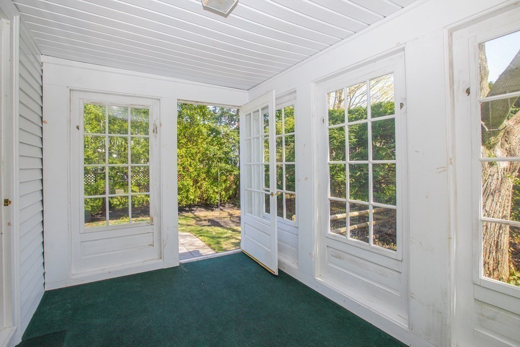 26 Hereford Road Marblehead, MA 01945 - Photo 15 of 23 a view of an empty room with wooden floor and a window
