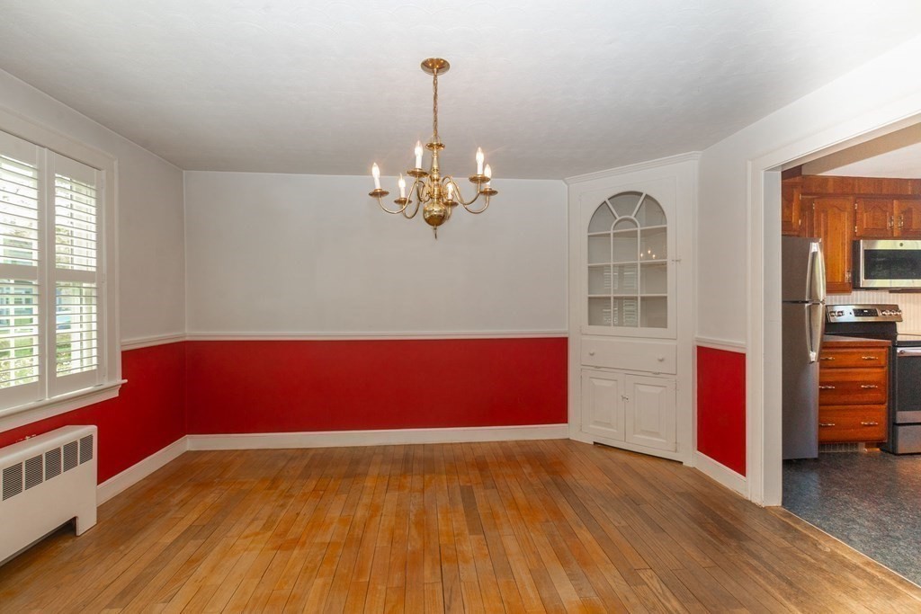 26 Hereford Road Marblehead, MA 01945 - Photo 16 of 23 a view of empty room with wooden floor and fan