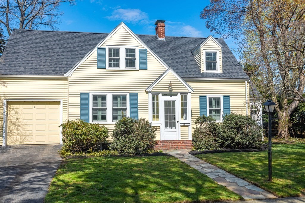 26 Hereford Road Marblehead, MA 01945 - Photo 2 of 23 a front view of a house with a garden