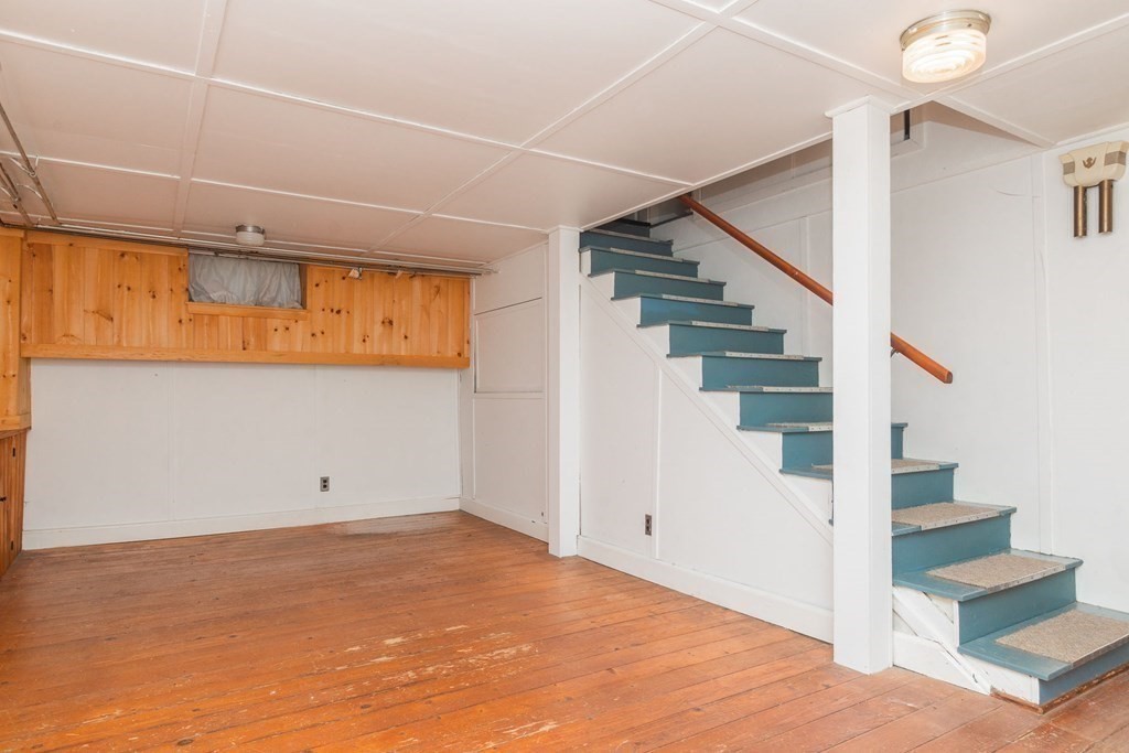26 Hereford Road Marblehead, MA 01945 - Photo 21 of 23 a view of an empty room with stairs