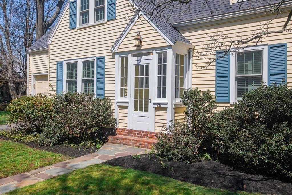 26 Hereford Road Marblehead, MA 01945 - Photo 3 of 23 a front view of a house with a yard and plants