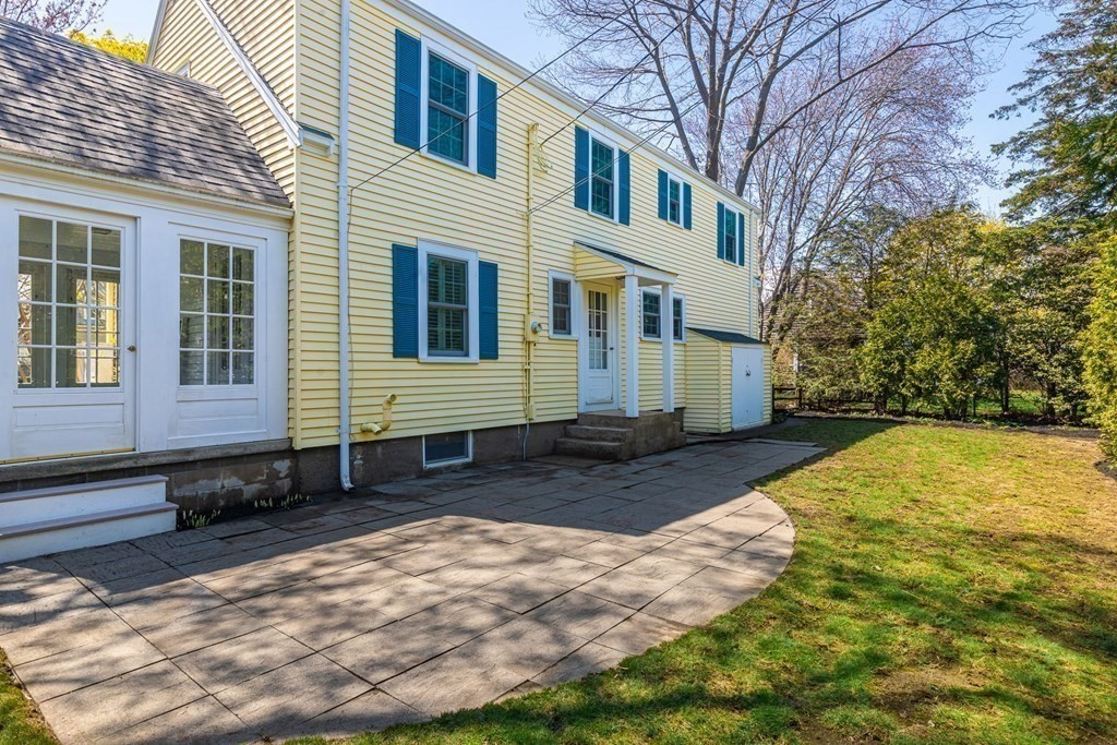 26 Hereford Road Marblehead, MA 01945 - Photo 5 of 23 a front view of a house with a yard