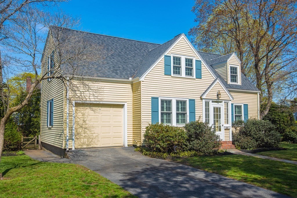 26 Hereford Road Marblehead, MA 01945 - Photo 6 of 23 a view of a house with a yard and flower plants