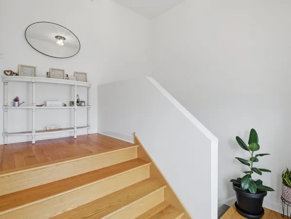 a view of an entryway with a tub