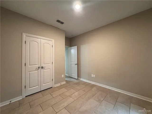 an empty room with closet