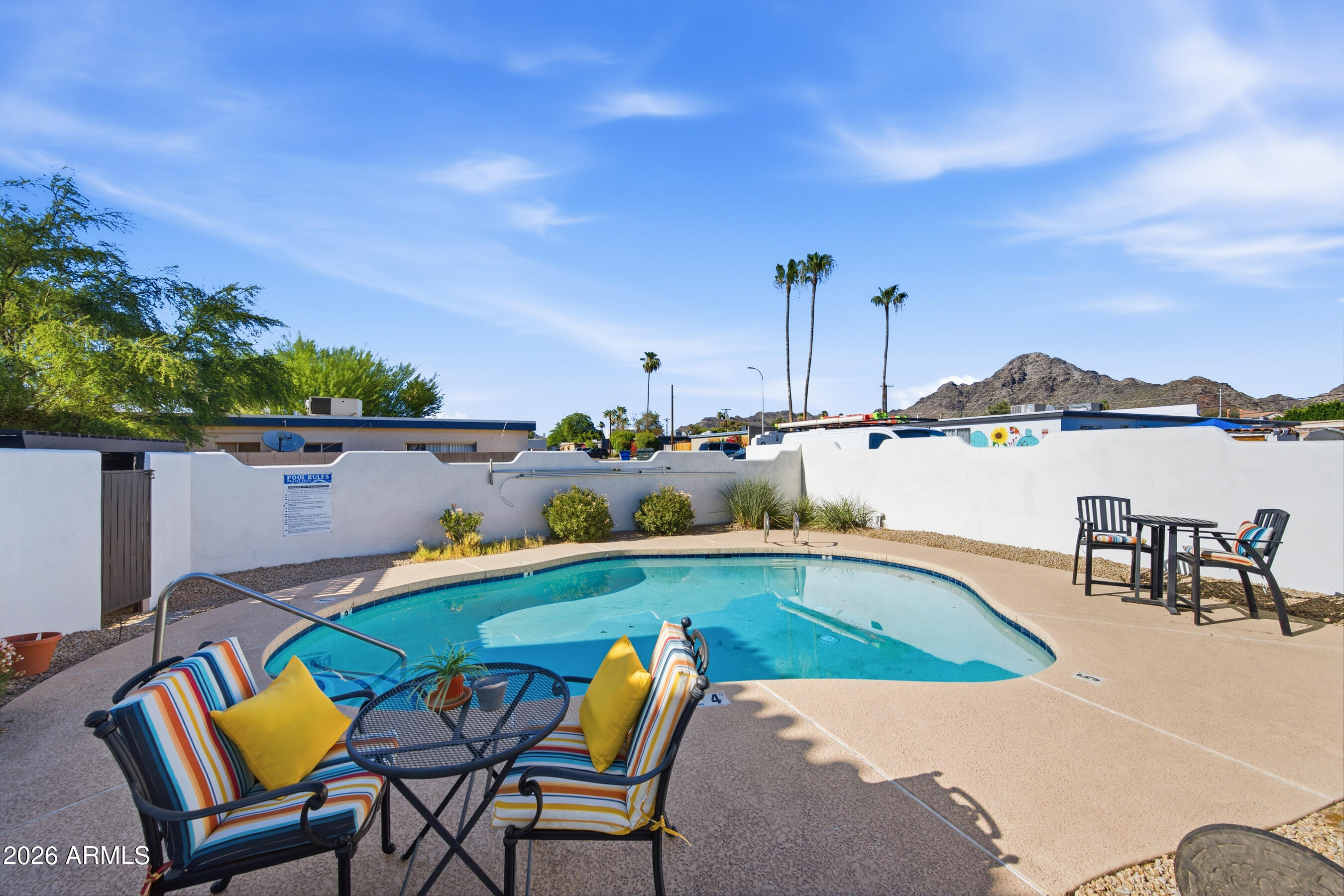 1702 East Ocotillo Road, Unit 1 Phoenix, AZ 85016 - Photo 27 of 27 a view of swimming pool with outdoor seating