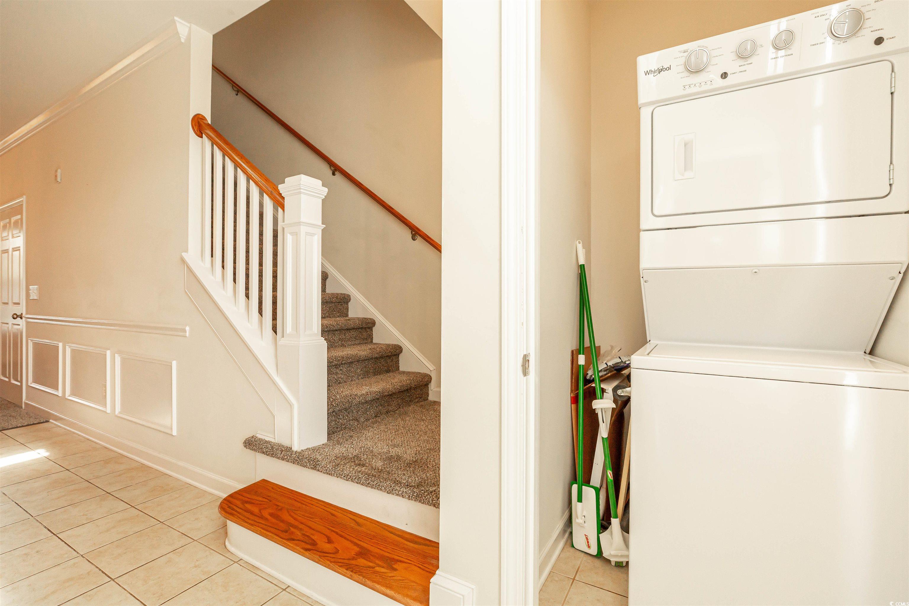 2954 Yancey Way, Unit B Myrtle Beach, SC 29577 - Photo 13 of 24 Laundry area featuring stacked washer and clothes