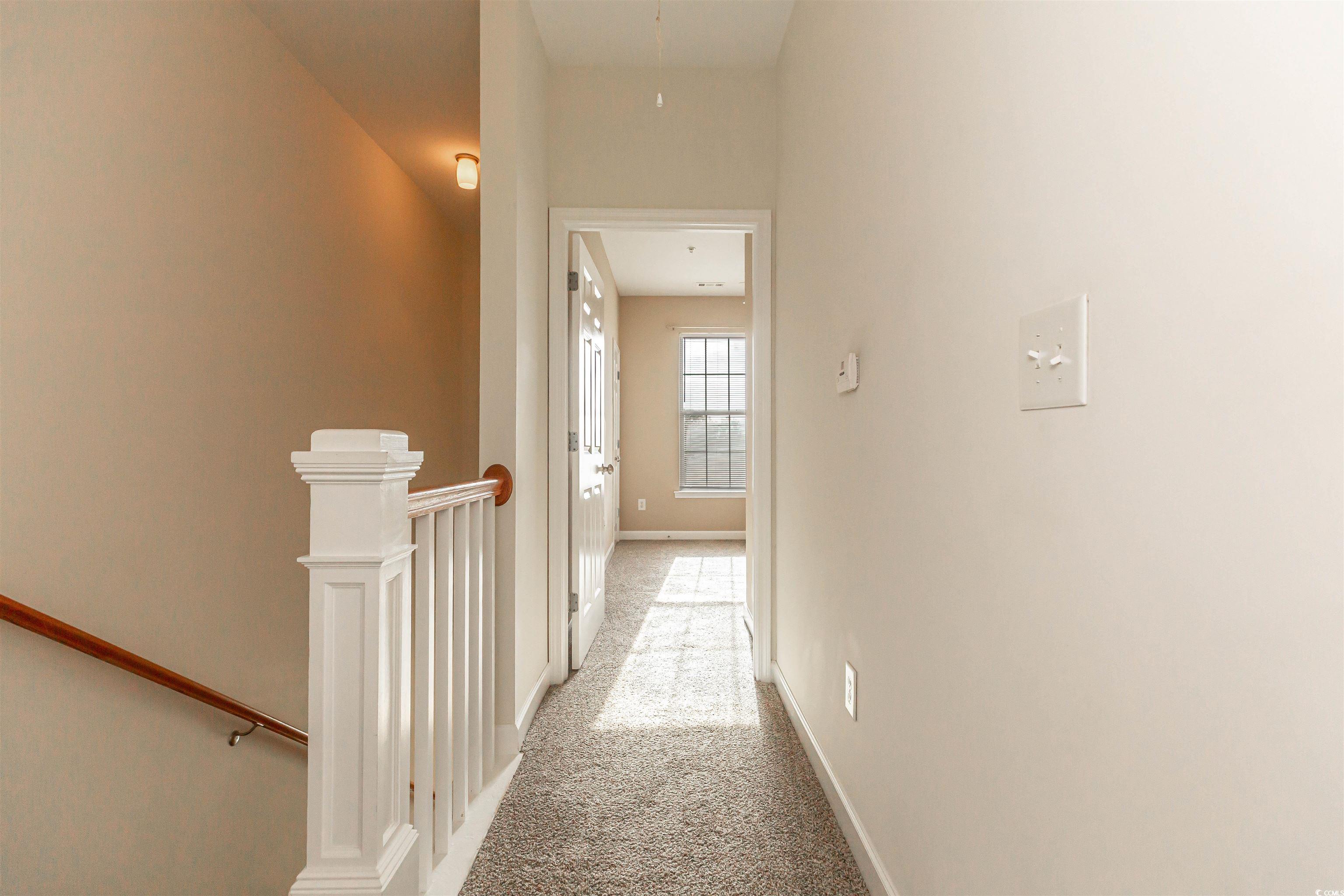 2954 Yancey Way, Unit B Myrtle Beach, SC 29577 - Photo 14 of 24 Corridor with attic access, baseboards, an upstair