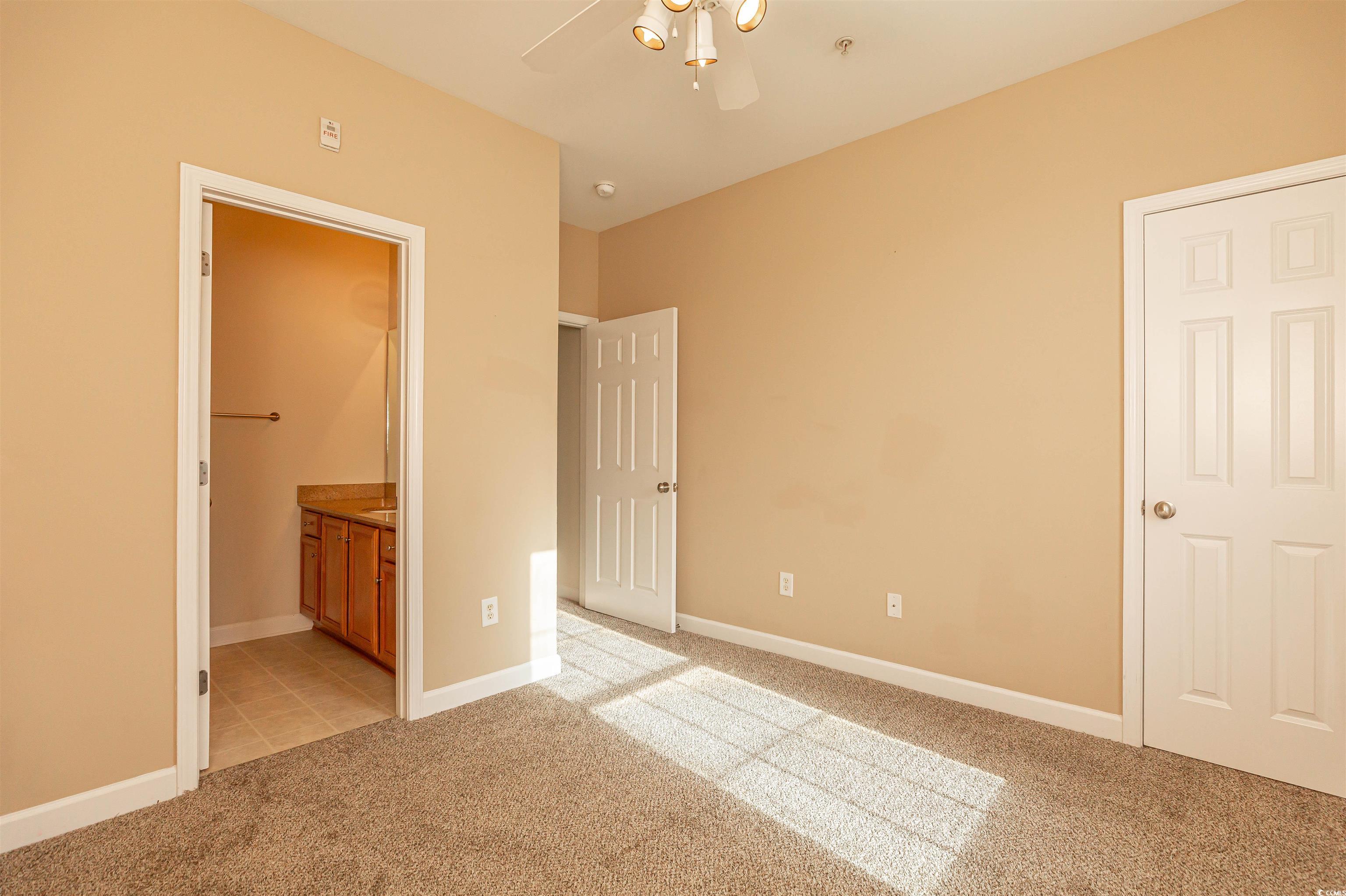 2954 Yancey Way, Unit B Myrtle Beach, SC 29577 - Photo 16 of 24 Unfurnished bedroom with light colored carpet, cei