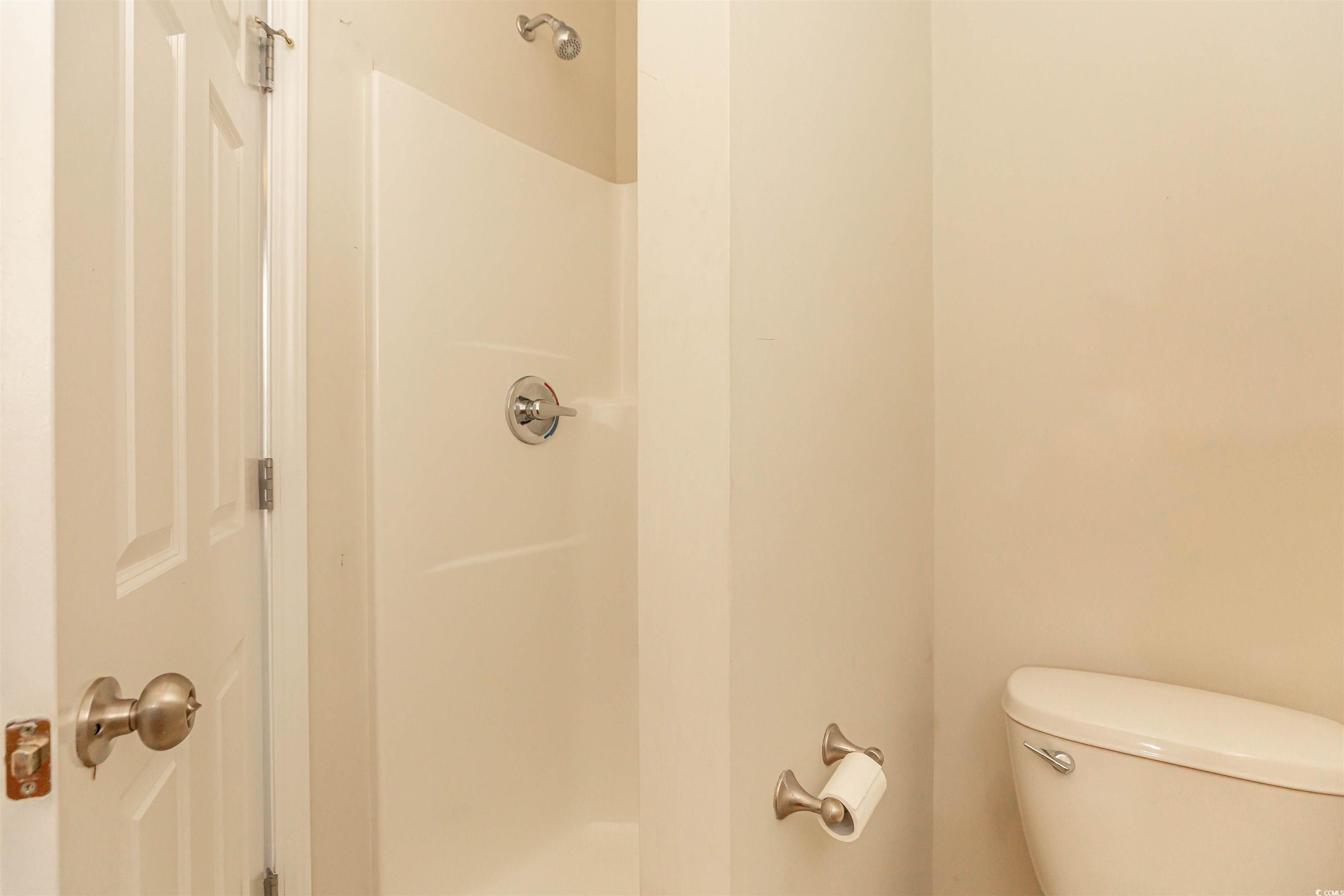 2954 Yancey Way, Unit B Myrtle Beach, SC 29577 - Photo 18 of 24 Bathroom featuring a shower and toilet