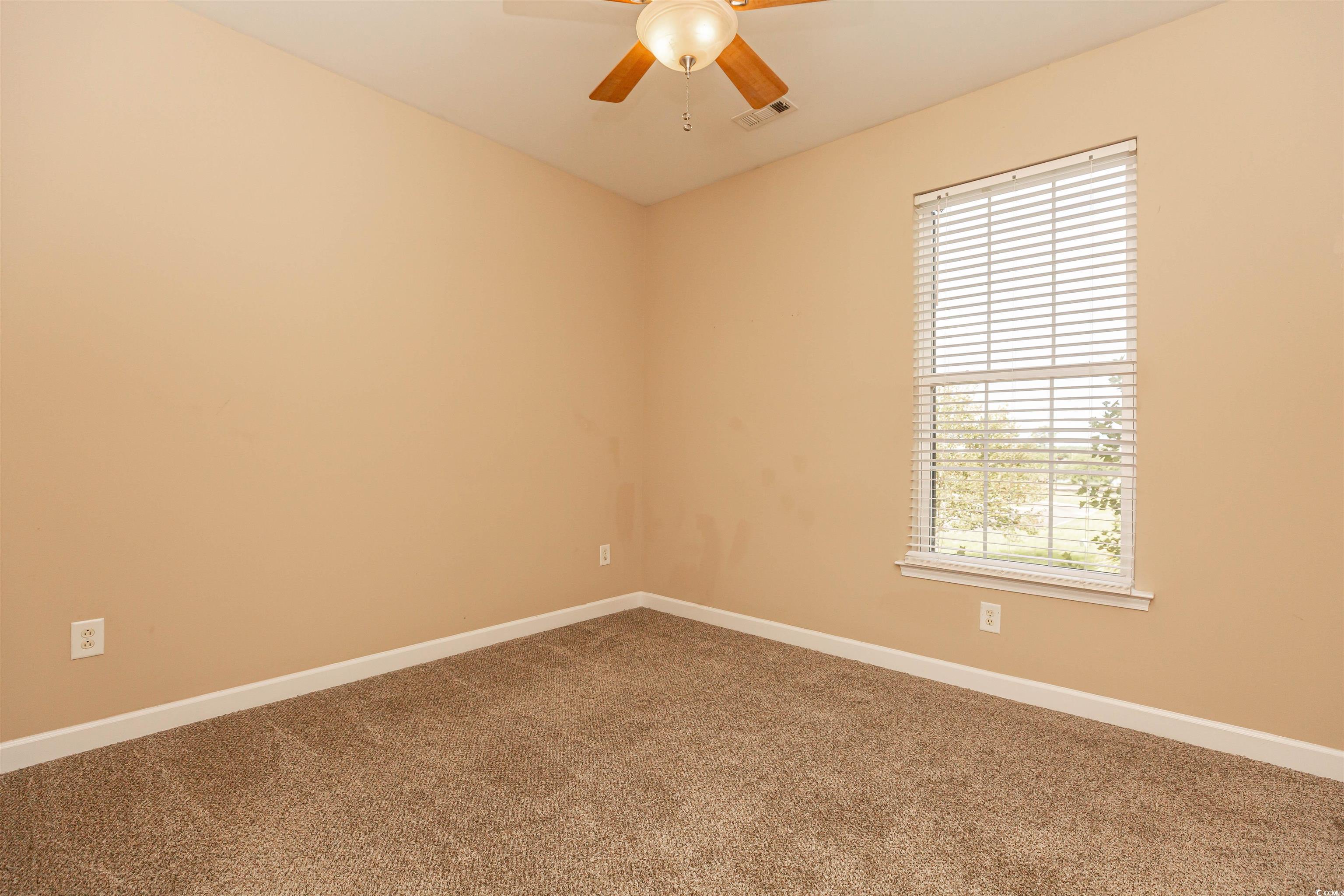 2954 Yancey Way, Unit B Myrtle Beach, SC 29577 - Photo 19 of 24 Spare room featuring carpet, visible vents, a ceil