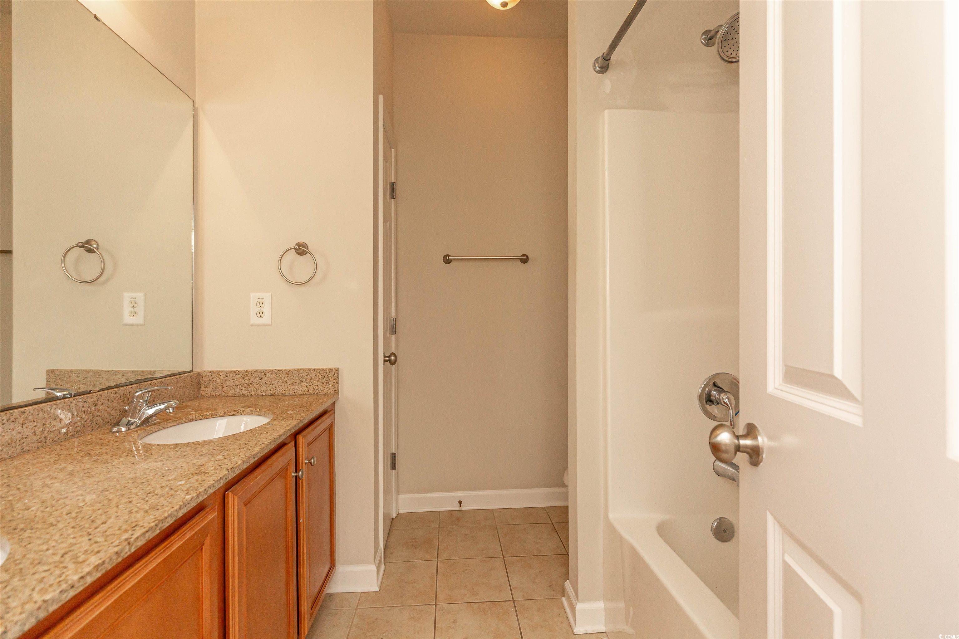 2954 Yancey Way, Unit B Myrtle Beach, SC 29577 - Photo 23 of 24 Bathroom featuring tile patterned floors, shower /