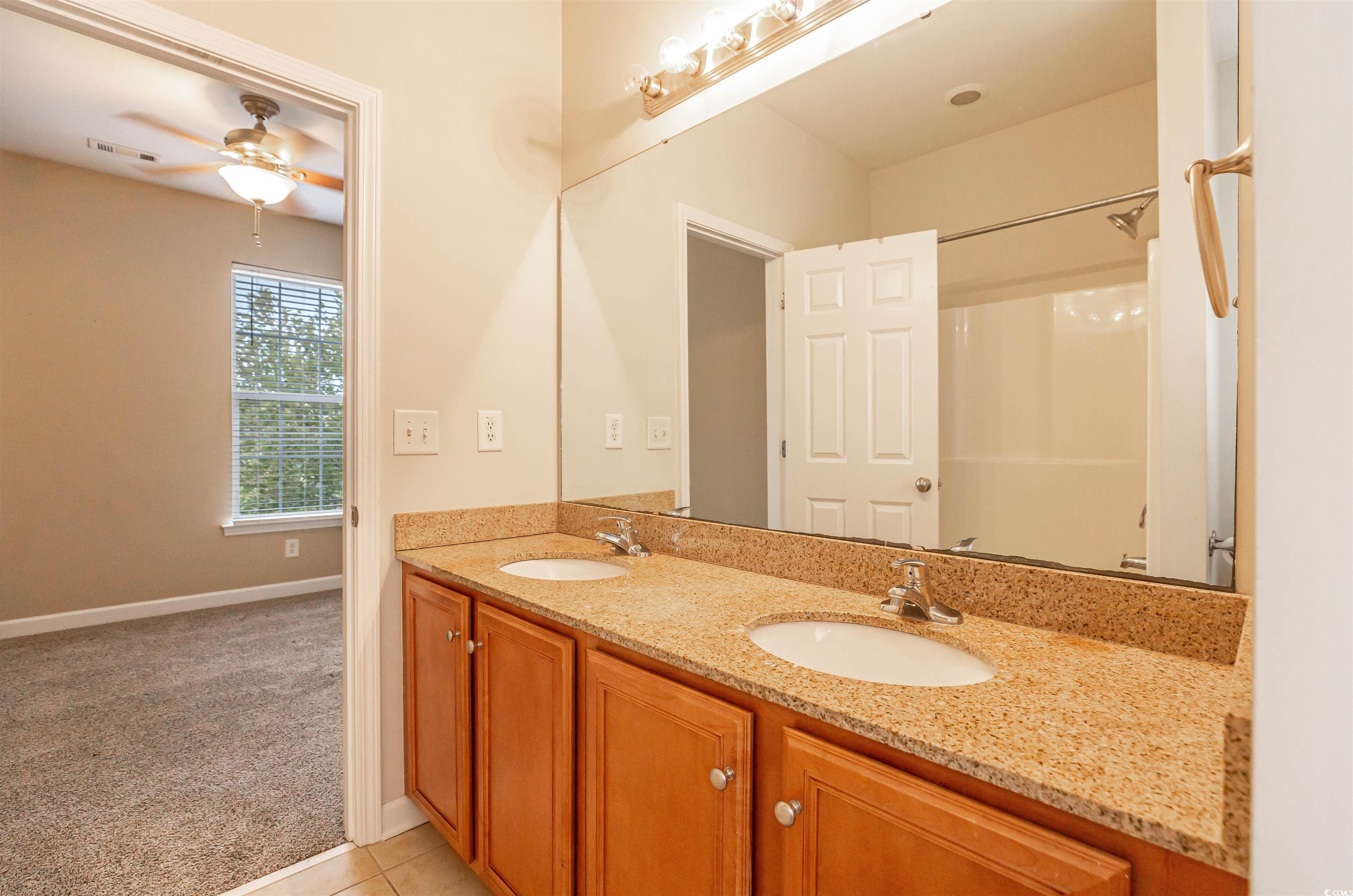 2954 Yancey Way, Unit B Myrtle Beach, SC 29577 - Photo 24 of 24 Bathroom with a ceiling fan, visible vents, a sink