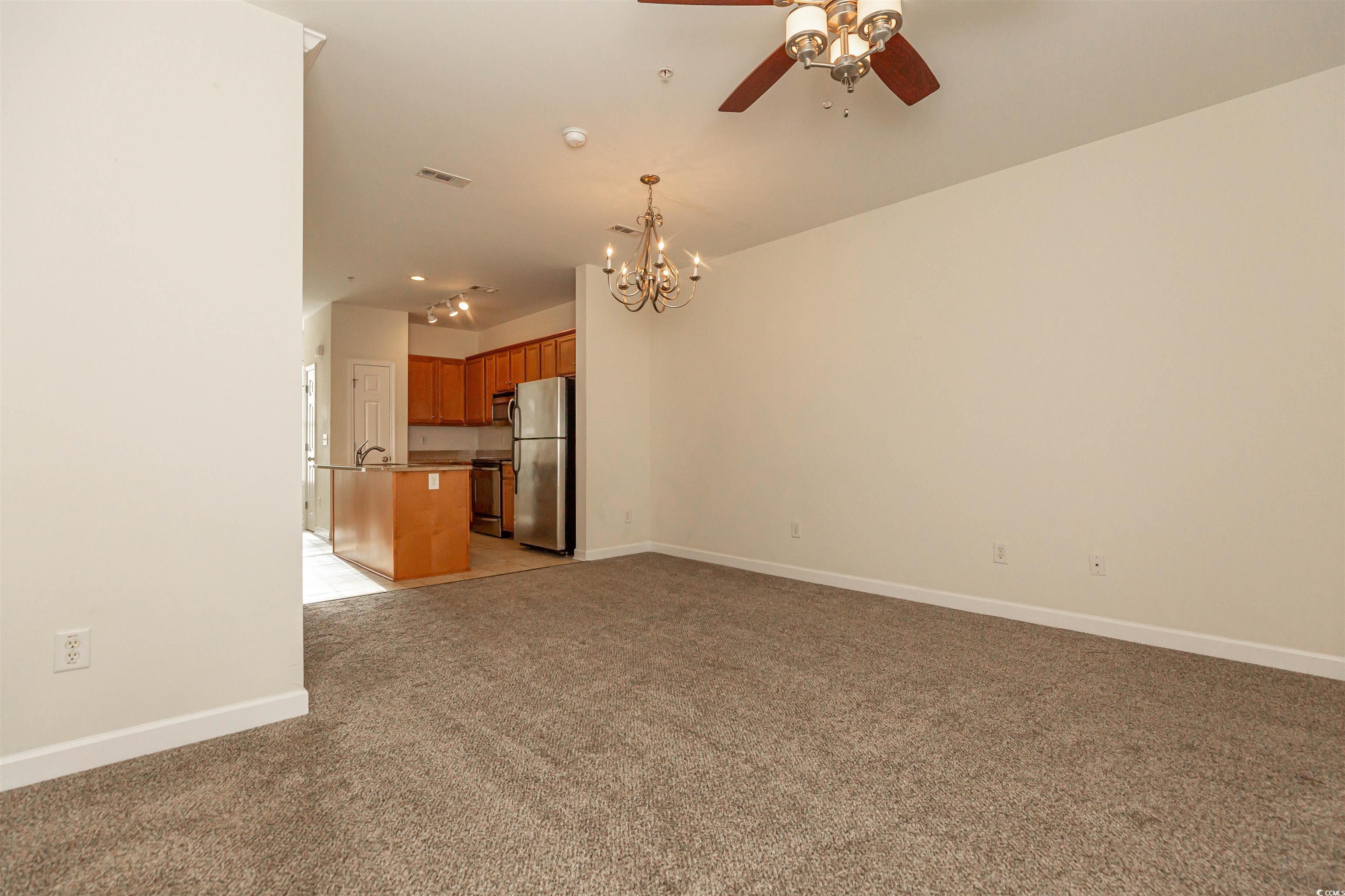 2954 Yancey Way, Unit B Myrtle Beach, SC 29577 - Photo 5 of 24 Unfurnished living room featuring visible vents, l