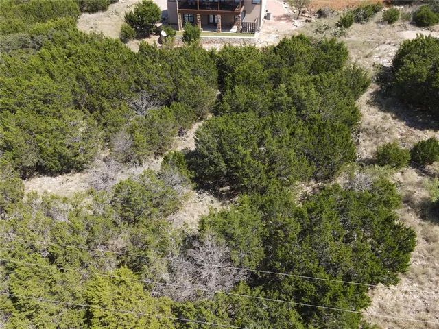 a view of a house with a small yard