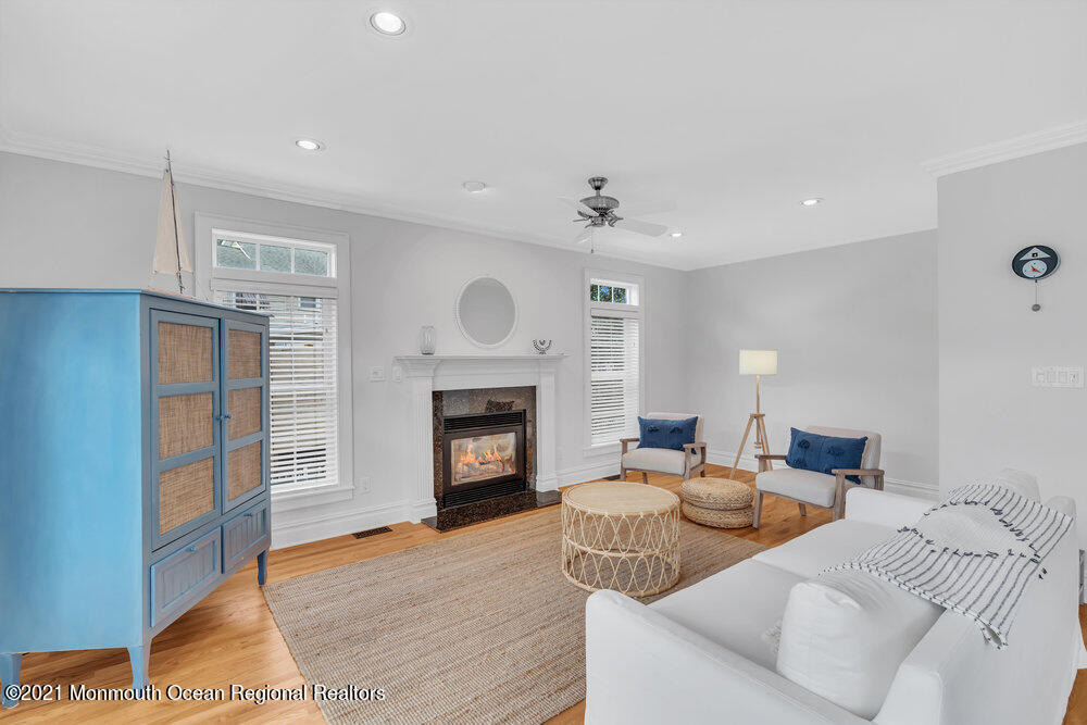 507 Washington Avenue Spring Lake, NJ 07762 - Photo 13 of 29 a living room with furniture and a fireplace