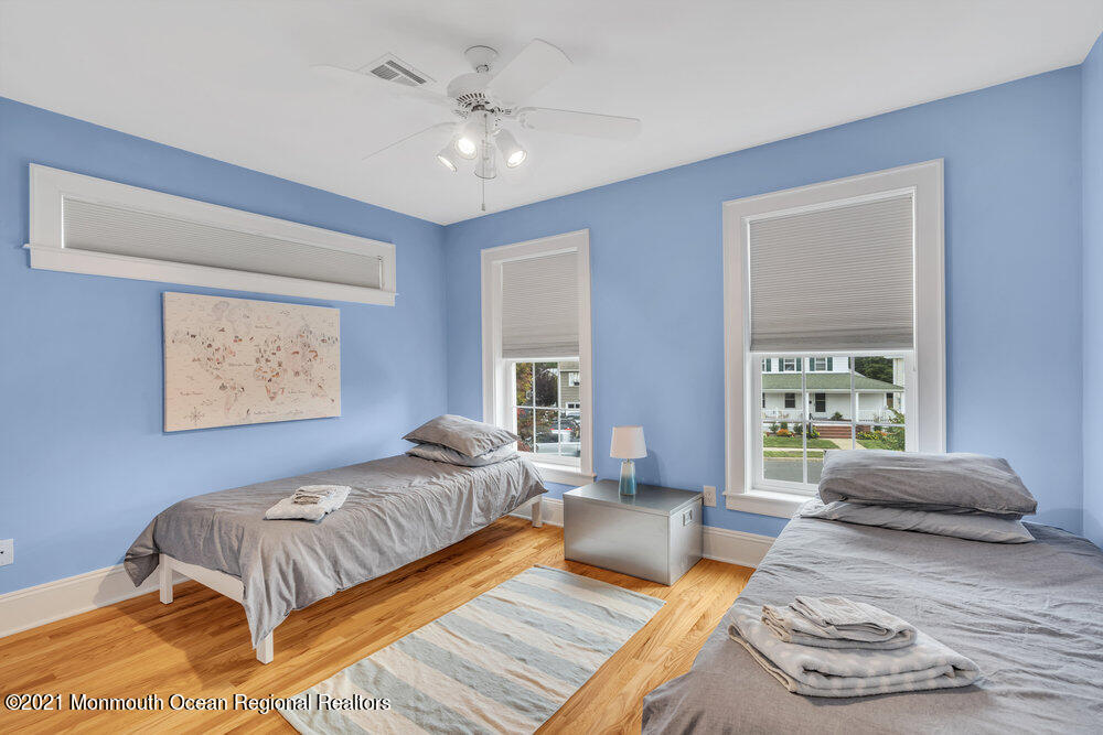 507 Washington Avenue Spring Lake, NJ 07762 - Photo 15 of 29 a living room with furniture and a large window