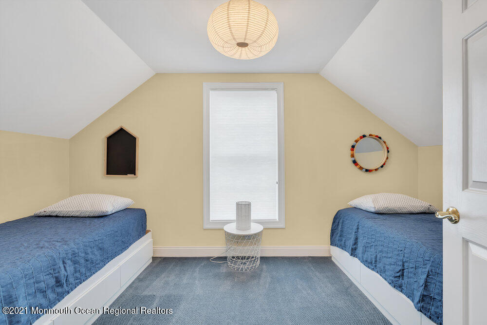 507 Washington Avenue Spring Lake, NJ 07762 - Photo 24 of 29 a bedroom with a bed and window