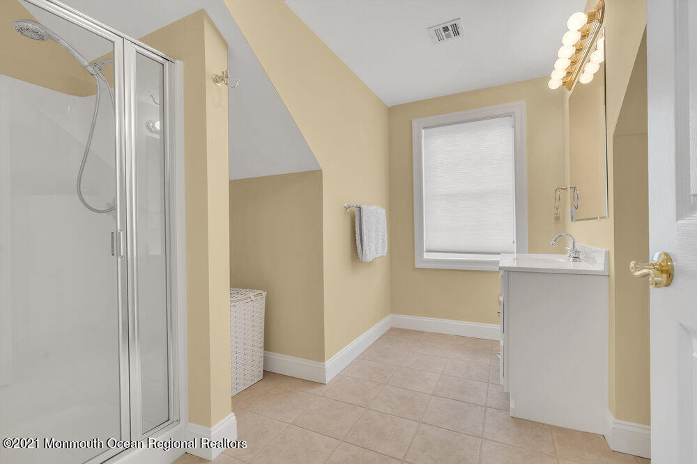 507 Washington Avenue Spring Lake, NJ 07762 - Photo 26 of 29 a bathroom with a shower and a sink