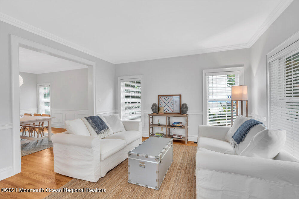 507 Washington Avenue Spring Lake, NJ 07762 - Photo 8 of 29 a living room with furniture and a large window