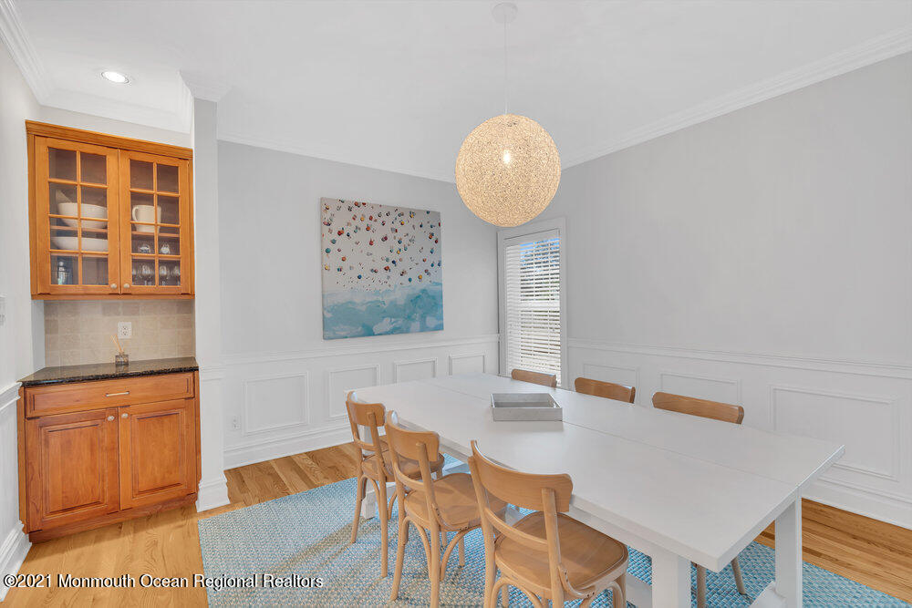 507 Washington Avenue Spring Lake, NJ 07762 - Photo 9 of 29 a view of a dining room with furniture and wooden floor