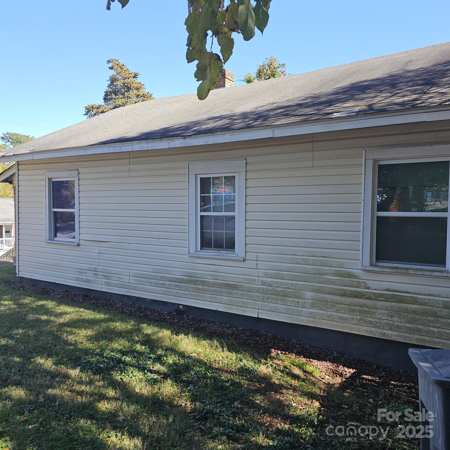929 Key Street Charlotte, NC 28208 - Photo 3 of 3 a front view of a house with a yard