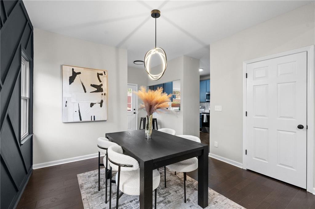 731 Dill Avenue Southwest Atlanta, GA 30310 - Photo 12 of 25 a view of a dining room with a table and chairs