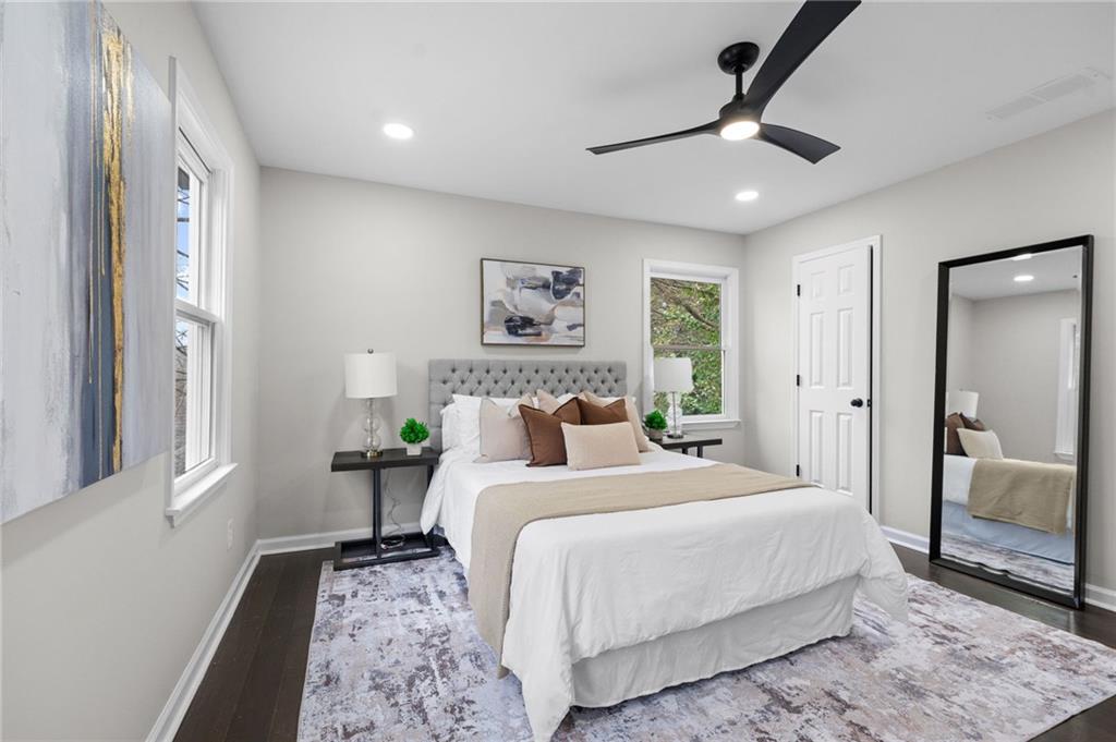 731 Dill Avenue Southwest Atlanta, GA 30310 - Photo 19 of 25 a bedroom with a bed and a painting on the wall