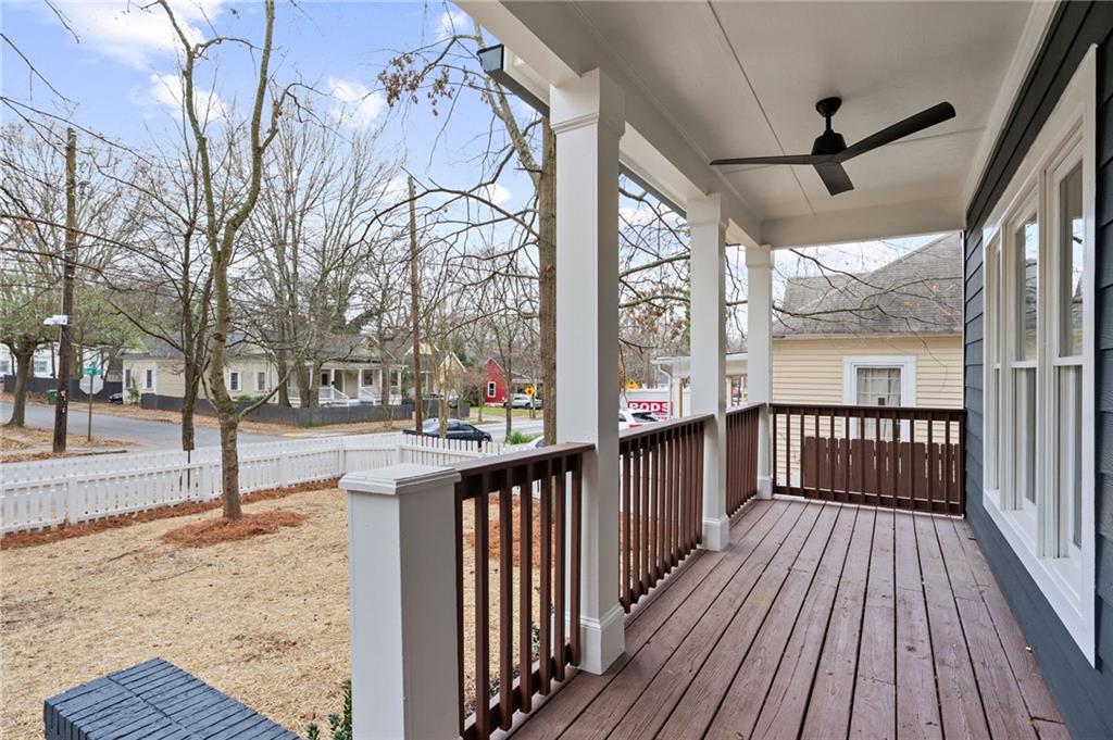 731 Dill Avenue Southwest Atlanta, GA 30310 - Photo 7 of 25 a view of a porch with wooden floor and iron stairs