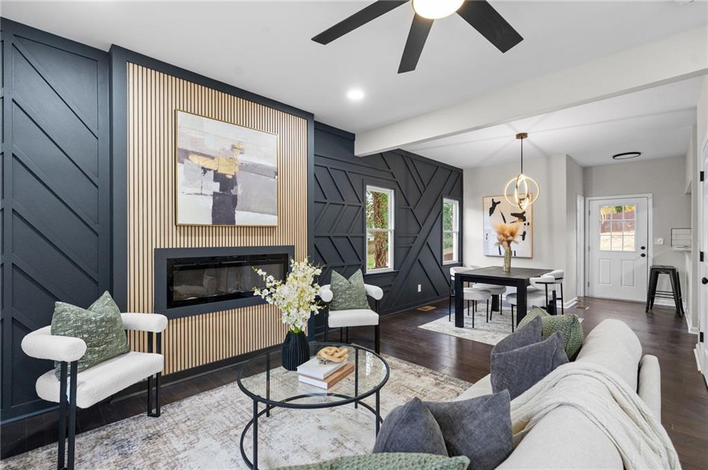 731 Dill Avenue Southwest Atlanta, GA 30310 - Photo 10 of 25 a living room with furniture and a fireplace