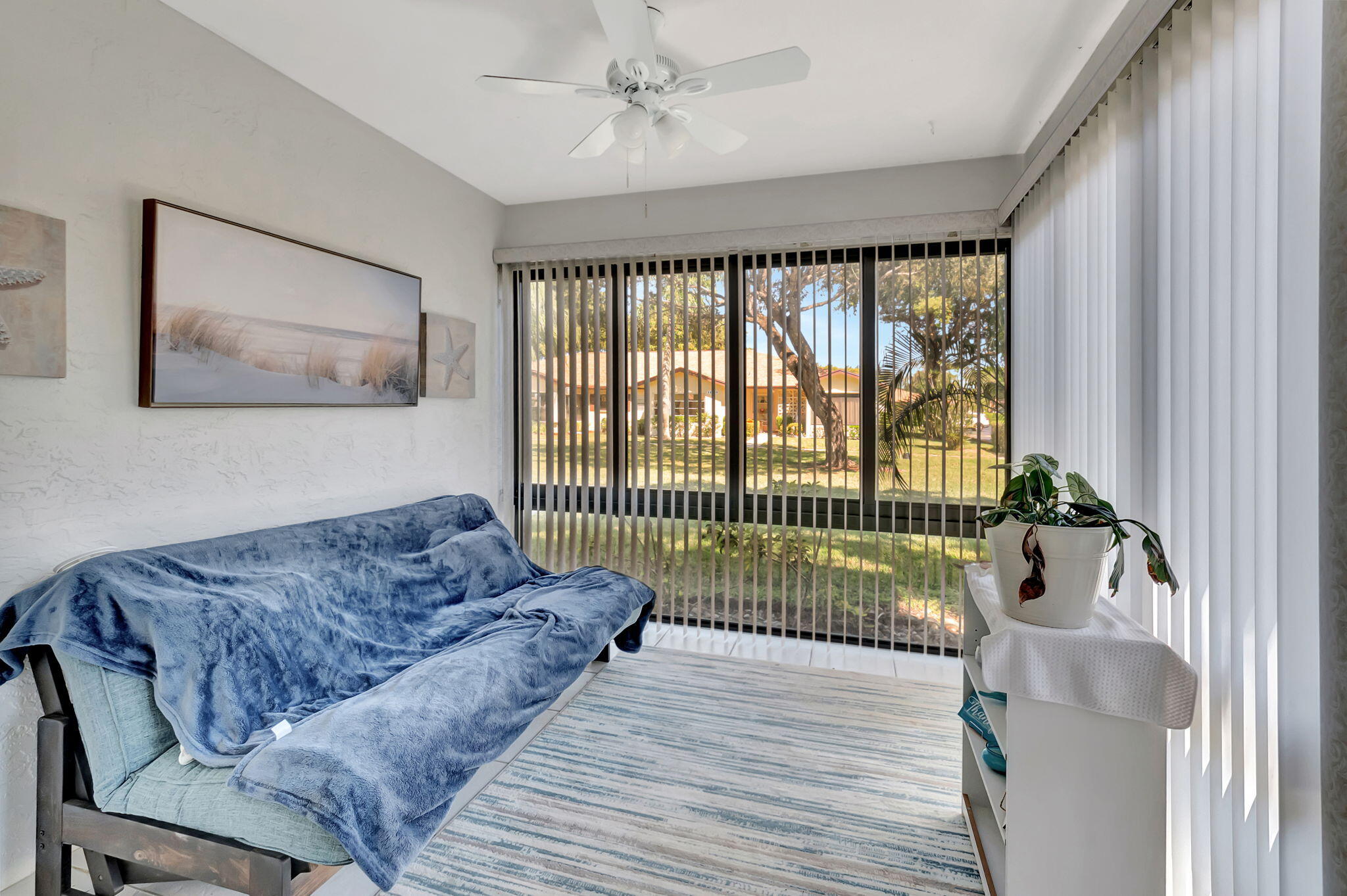 14110 Nesting Way, Unit A Delray Beach, FL 33484 - Photo 12 of 30 a living room with furniture and a flat screen tv