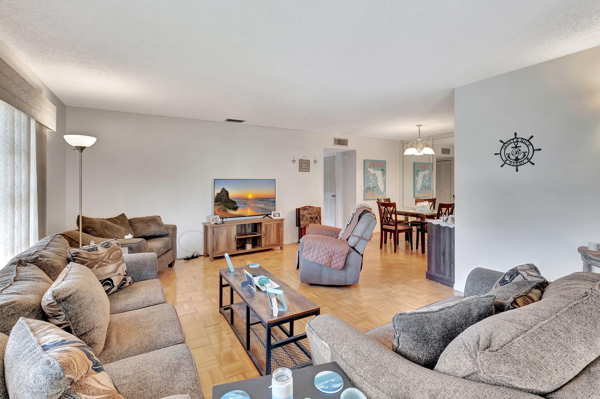 14110 Nesting Way, Unit A Delray Beach, FL 33484 - Photo 3 of 30 a living room with furniture and wooden floor