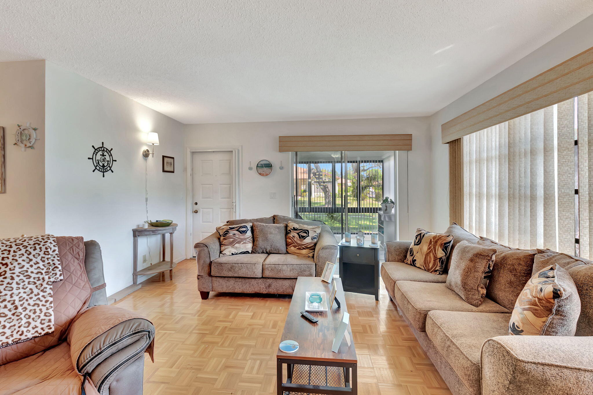 14110 Nesting Way, Unit A Delray Beach, FL 33484 - Photo 5 of 30 a living room with furniture and a large window