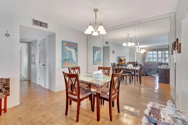 a view of a dining room with furniture