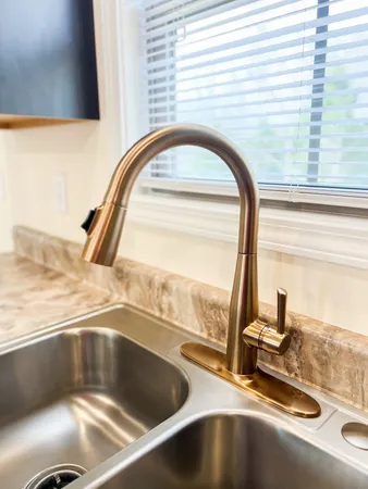 a view of a sink and a window