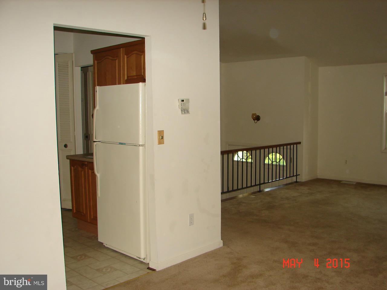 1312 Ava Road Severn, MD 21144 - Photo 3 of 15 a view of a hallway with a room
