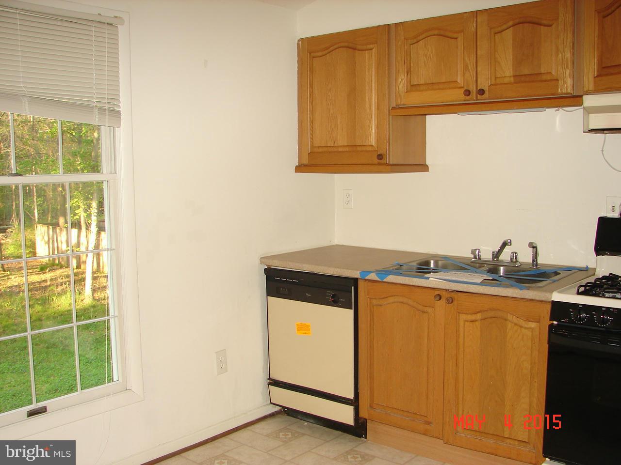 1312 Ava Road Severn, MD 21144 - Photo 4 of 15 a utility room with dryer and washer