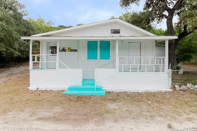 front view of a house and a yard