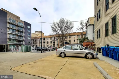 a car parked in front of a building
